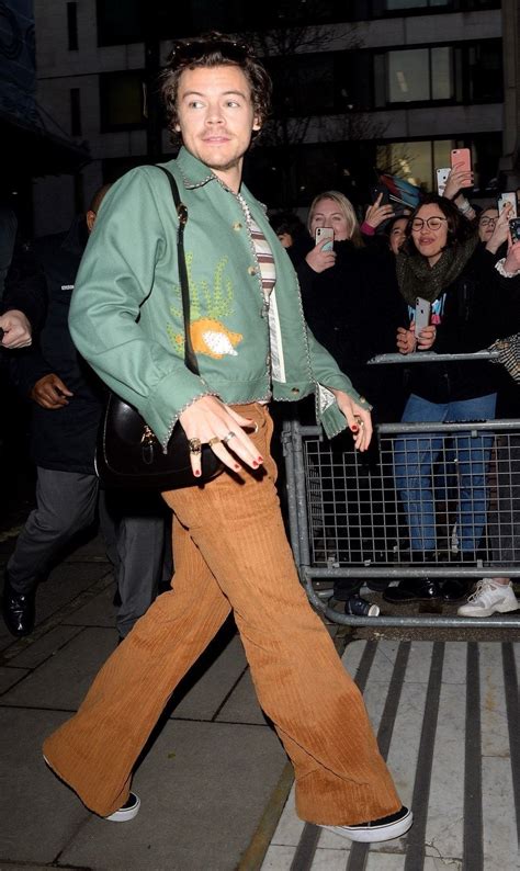 harry styles gucci handcuffs|Harry Styles handbags.